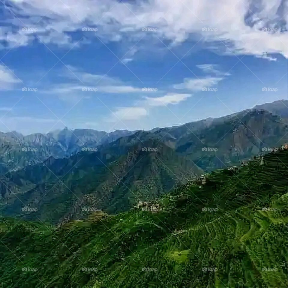 Glory be to God, the magnificent and picturesque view and the natural green trees are a view that is nothing more wonderful than it