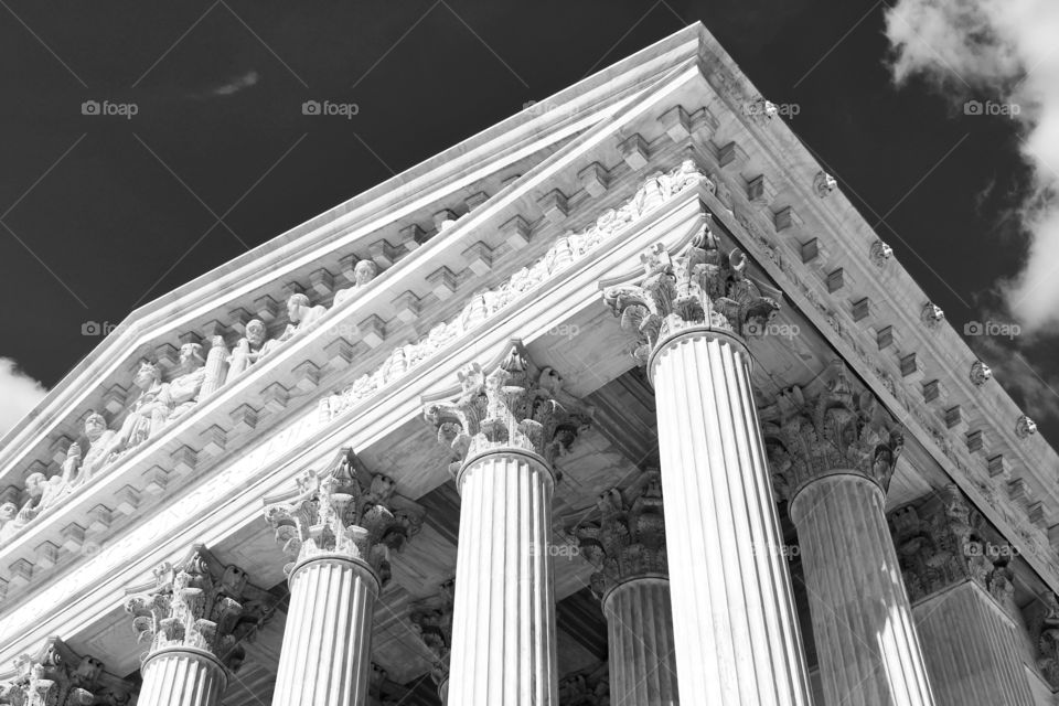 US Supreme Court. Detail of the entablature, pediment and column capitals. 