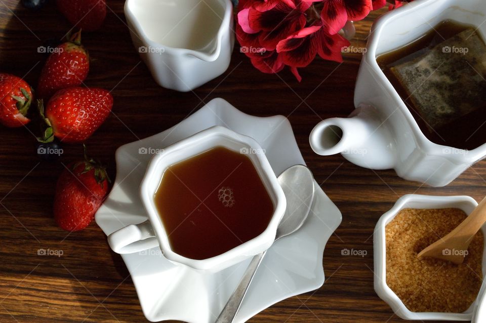 High angle view of breakfast on wooden table