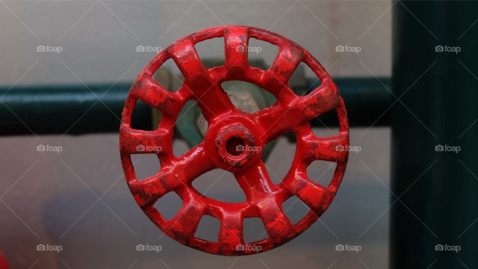 Shut it tight, red iron valve handle.