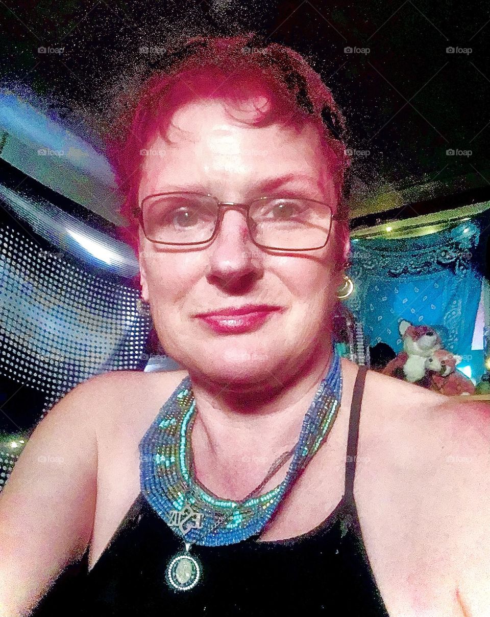 A self portrait aboard “Salvation”, our 28 ft “Luhrs” cabin cruiser that is tied up at “Newtown Creek” by the “Pulaski Bridge” in Long Island City, Queens. 2021. Hypnotic Productions