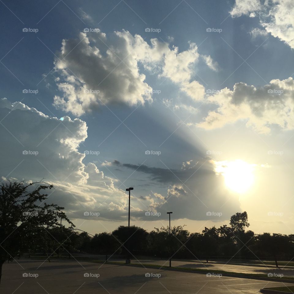 Sun rays through clouds 