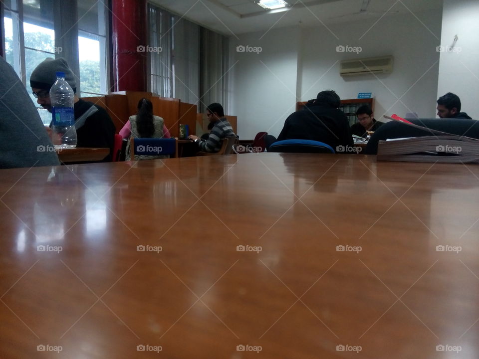 students library studying chairs table interior air conditioner bottle