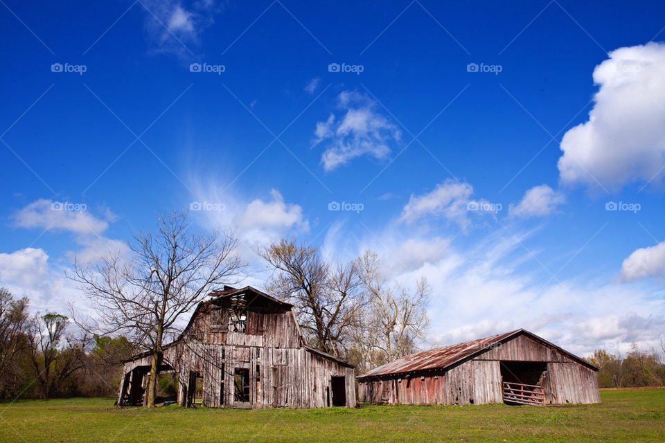 sky blue clouds barn by jmalonear