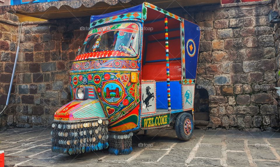 A colorful rickshaw that symbolizes the colorful & full of life culture of the South Asia!