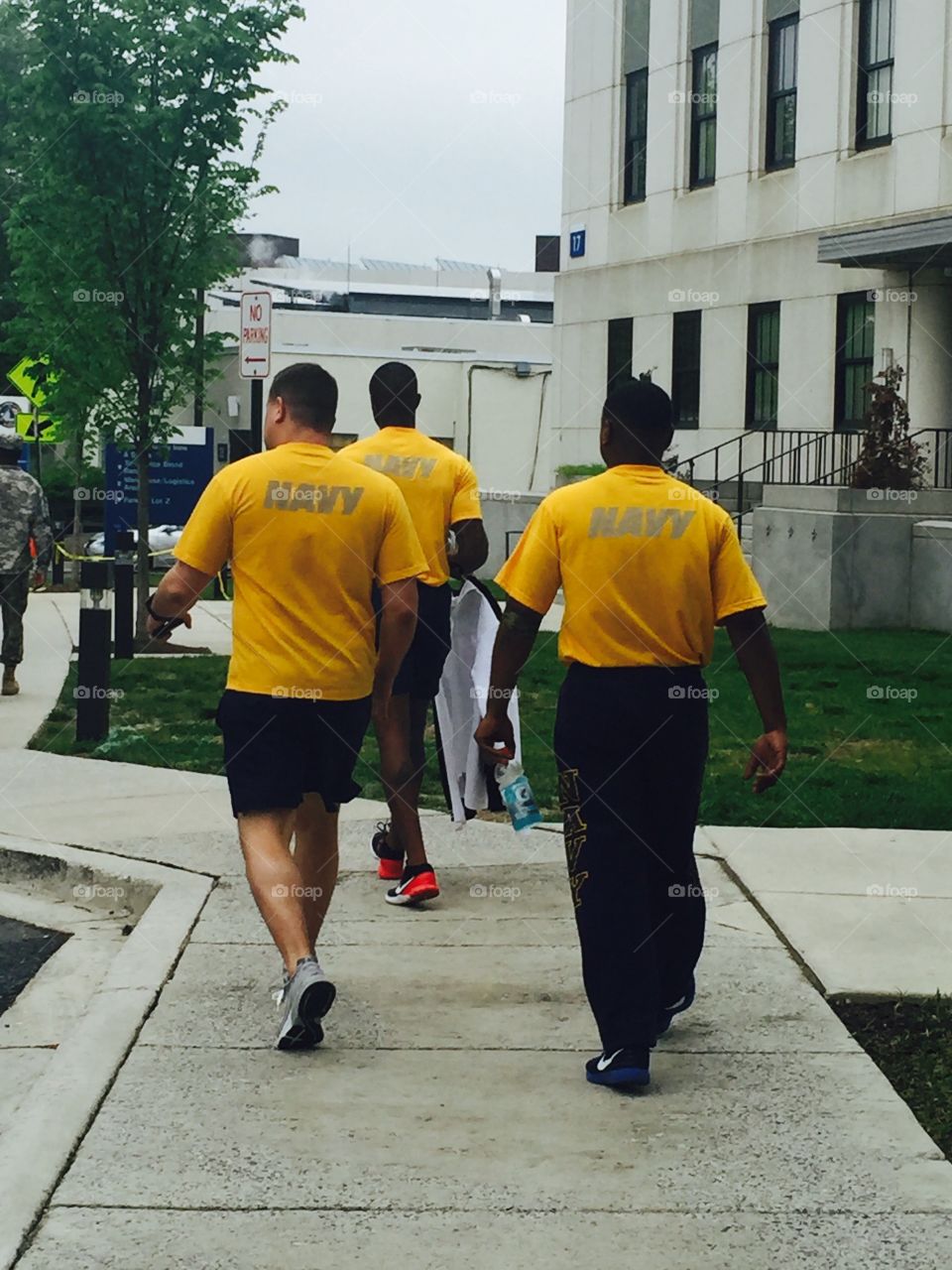 Navy military officers walking 