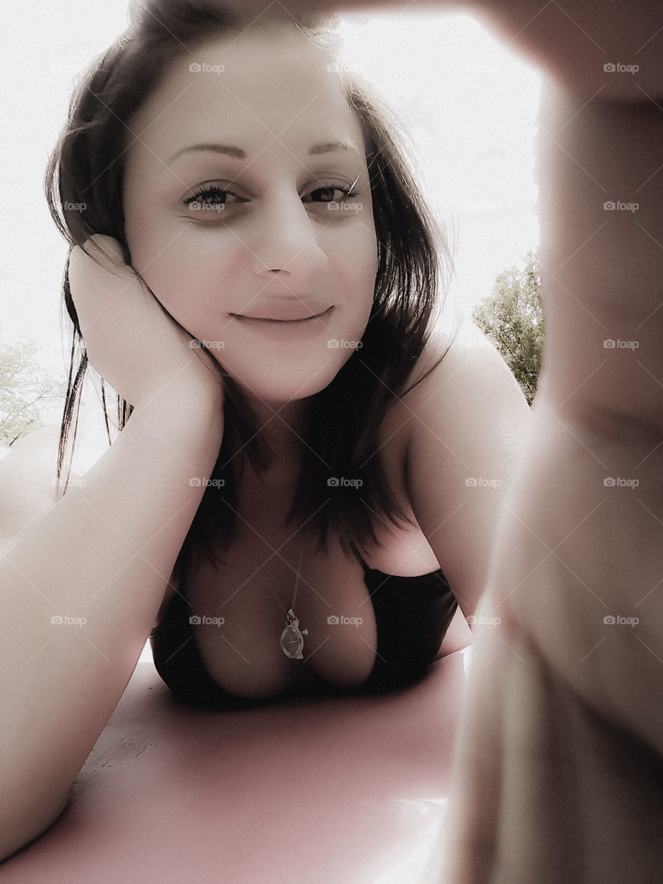 frame your selfie while sun bathing