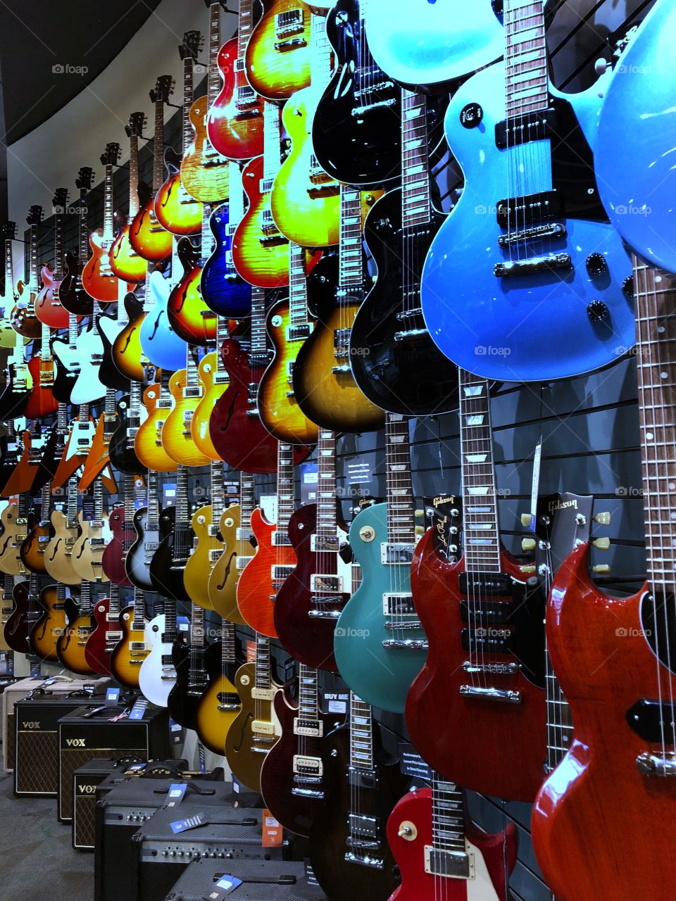 An electric guitarists playground. A colourful line up of beautiful electric guitars. Grab a pick and take your pick and rock on! 