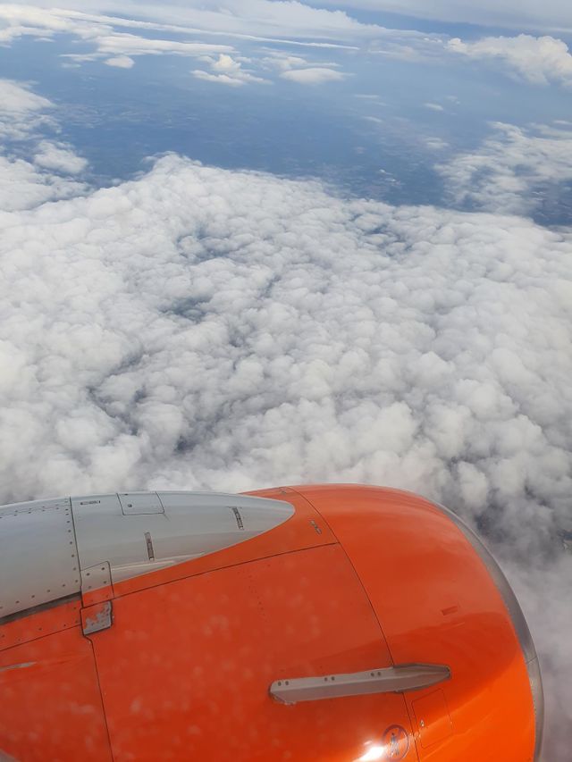 flying over the clouds