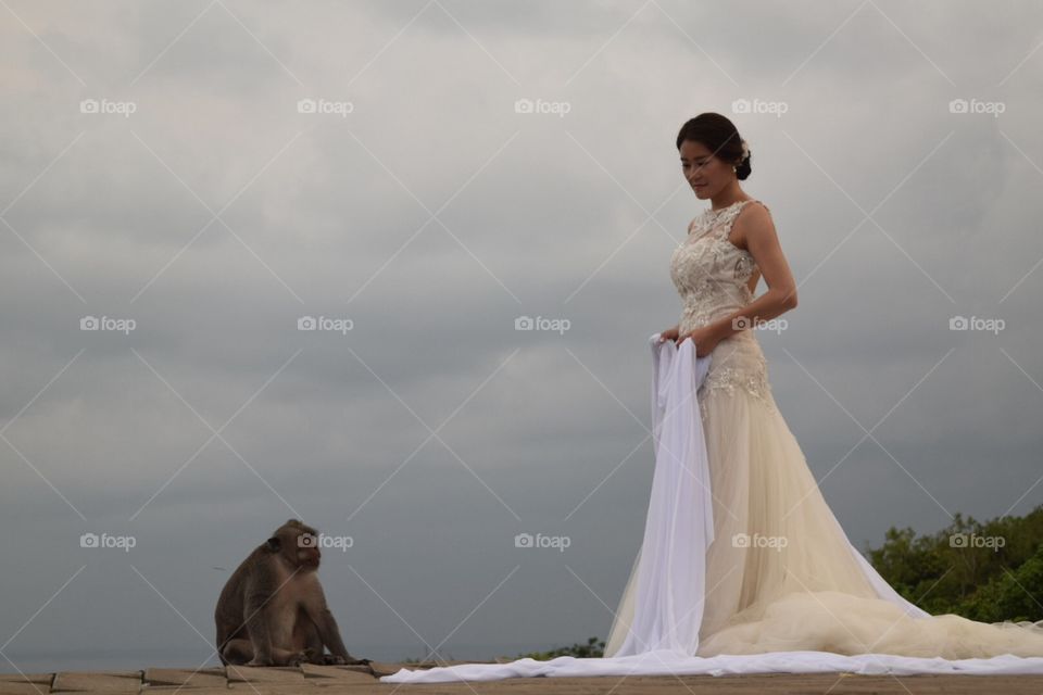 Woman wedding dress monkey