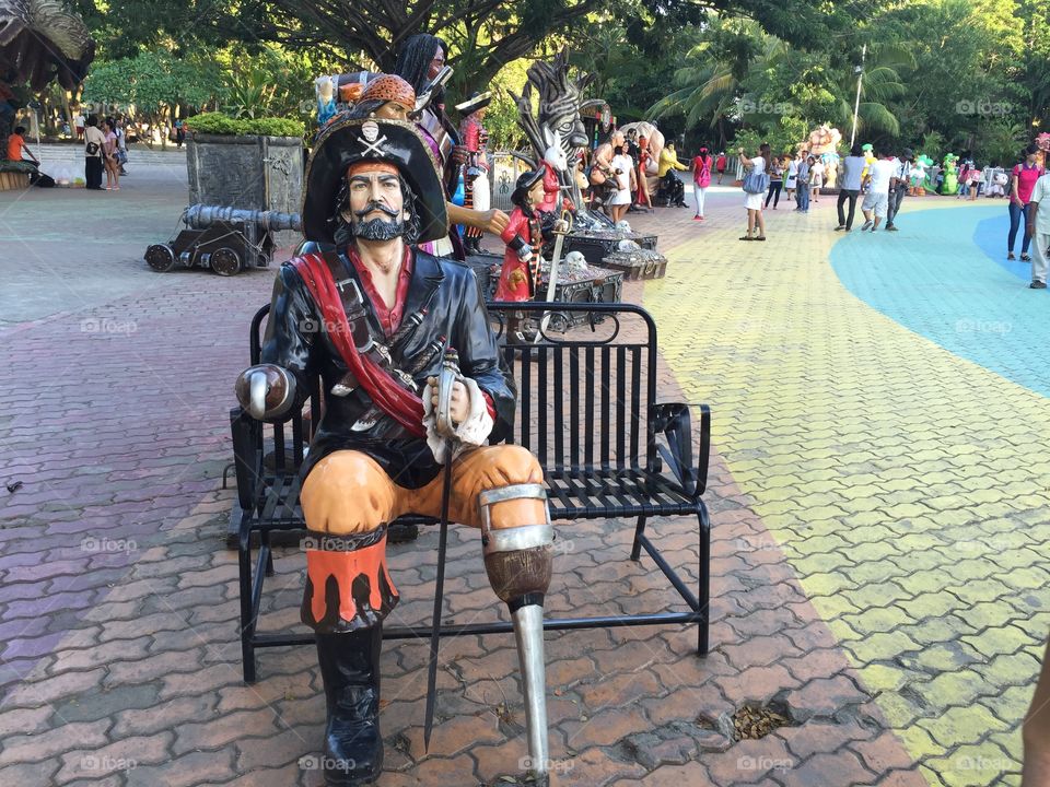 A statue of pirate in a park