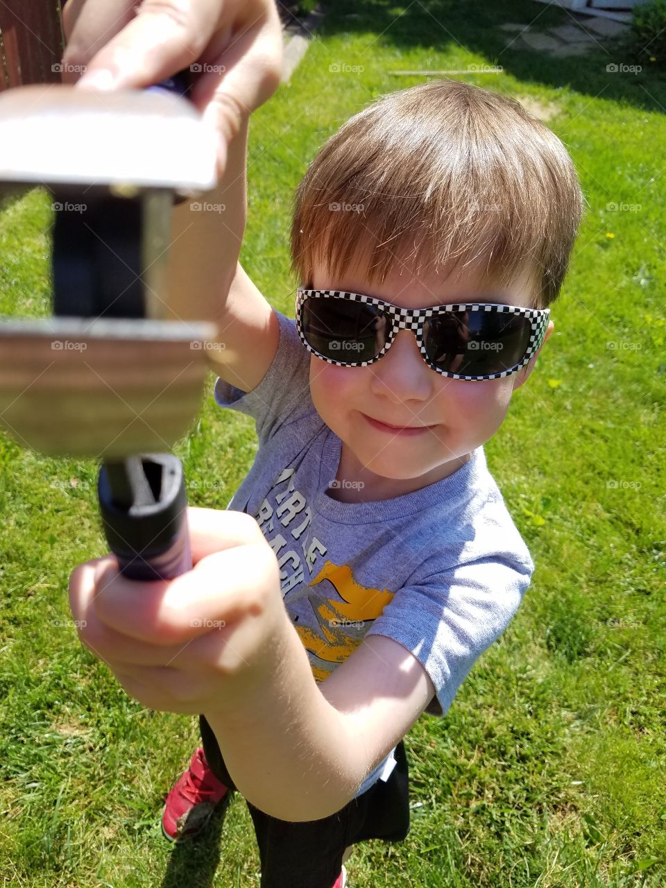 Child using a tool