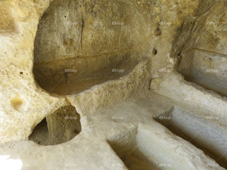 Ancient Crete catacombs carved in stone