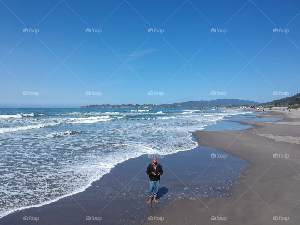 a selfie drone pic at Stinson Beach on a beautiful sunny day