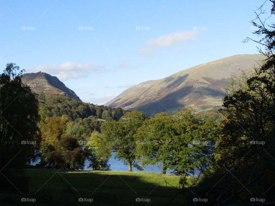 The fells beyond the lake photo taken at the lake district cumbria🏞