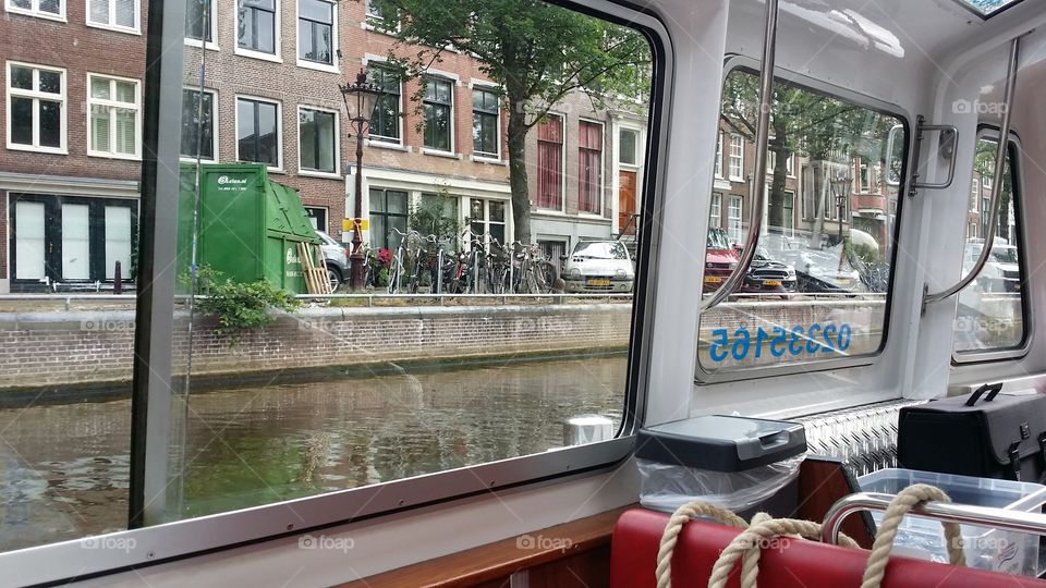 navigating the canals in Amsterdam