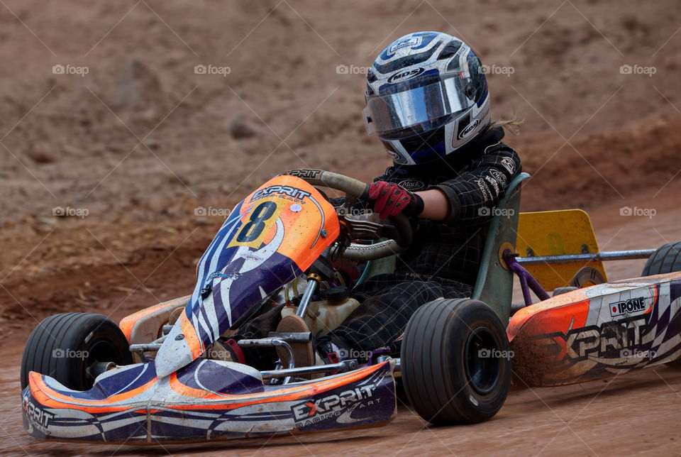 Go cart racing in the dirt