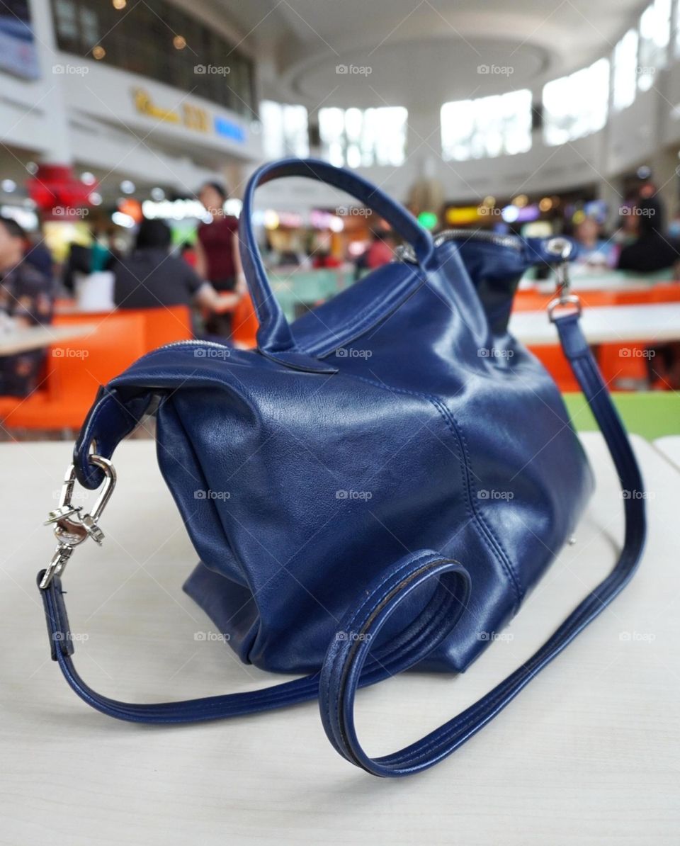 woman's blue bag - blue