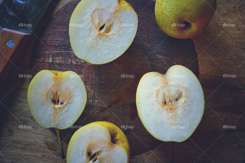 pears placed on a chopping board