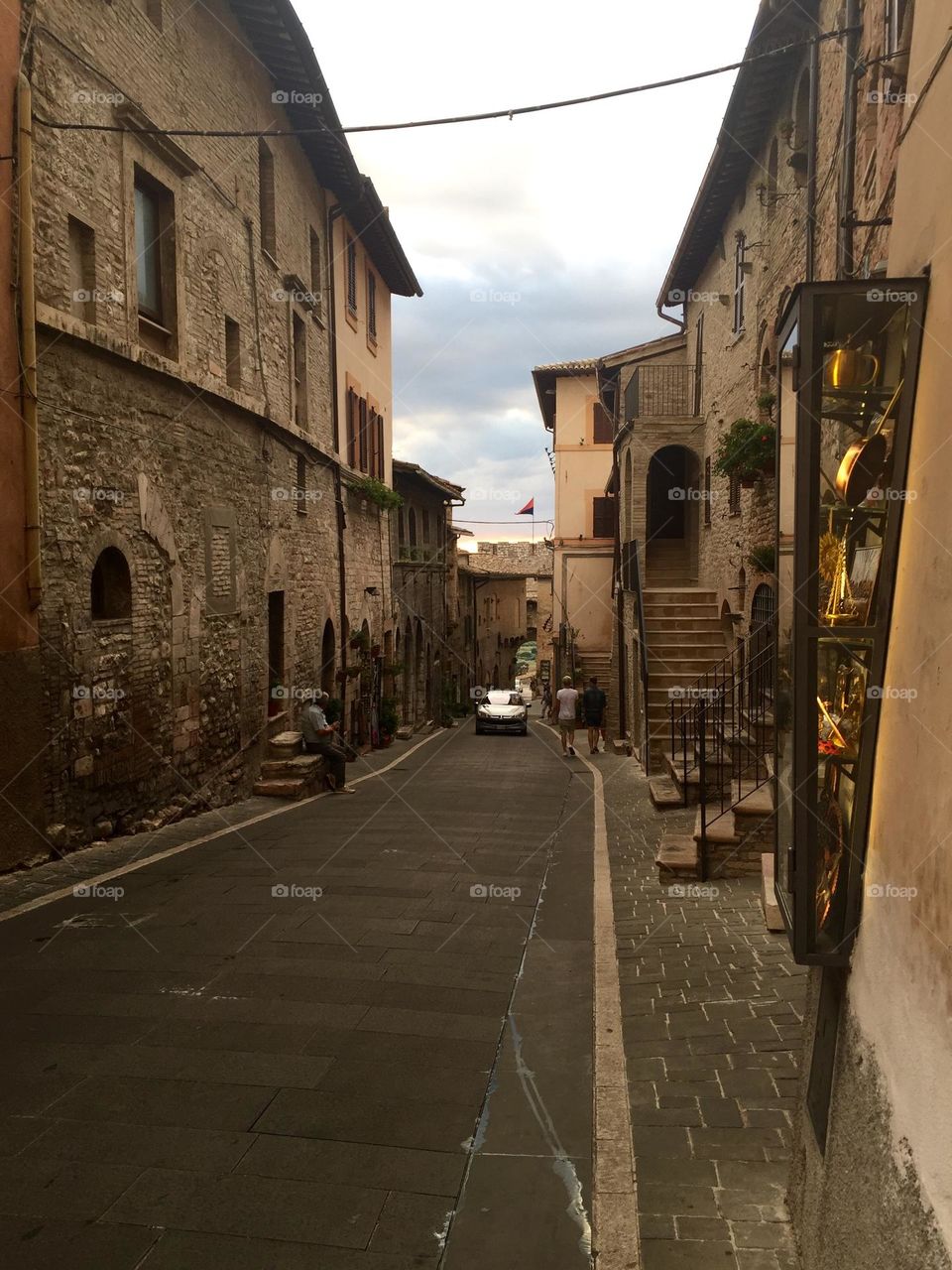 ancient houses and buildings among the streets and alleys of assisi, medieval village in Umbria, Italy 