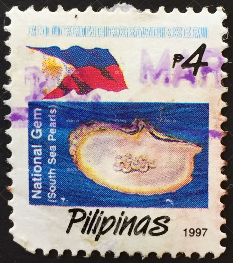 Pilipenas stamp showing flag and pearls