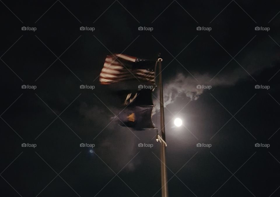 flags with moon at night