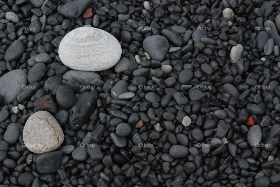 Black and grey pebbles in iceland