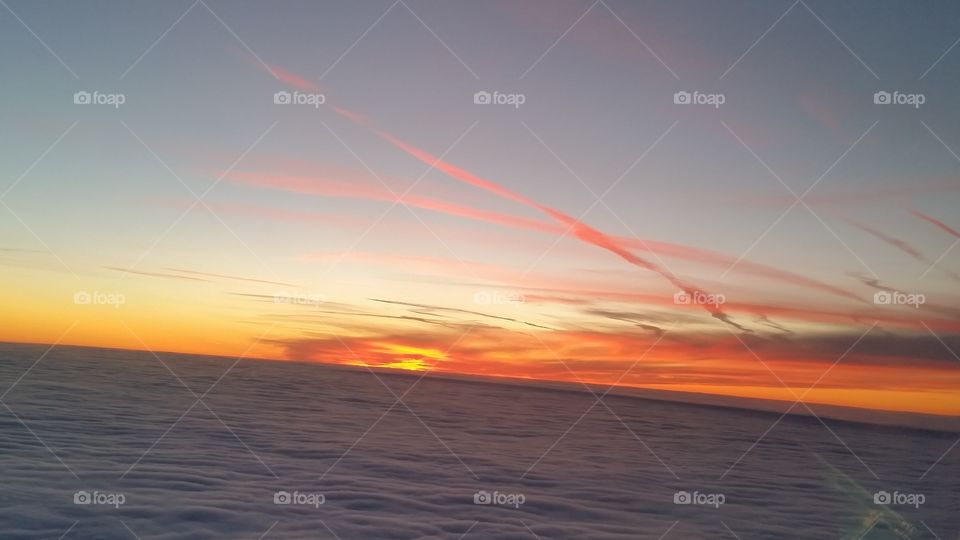 sunset above the clouds