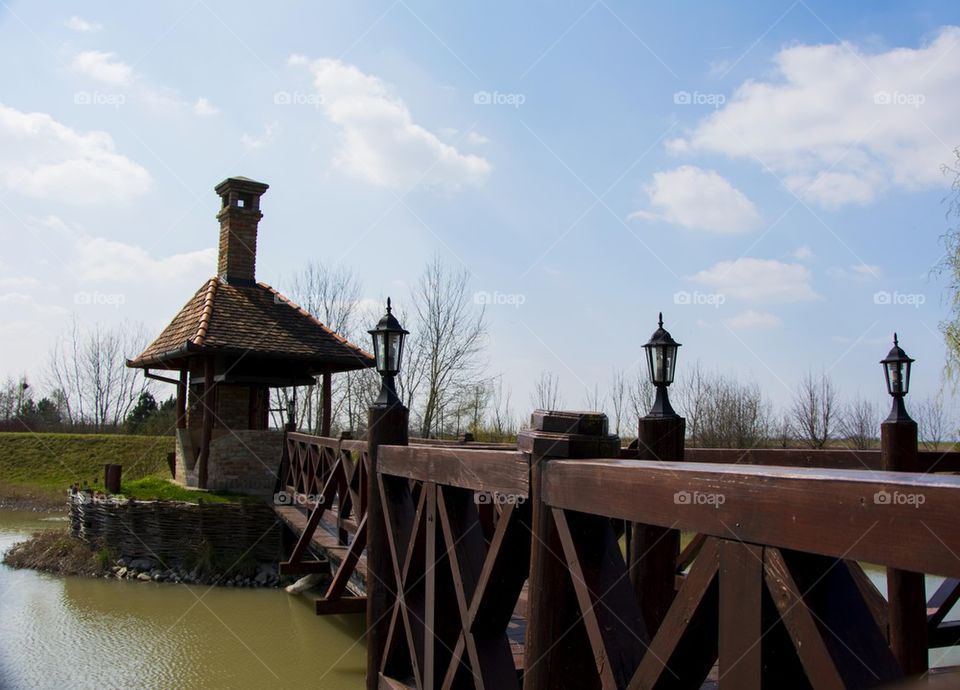 wooden bridge accross lake