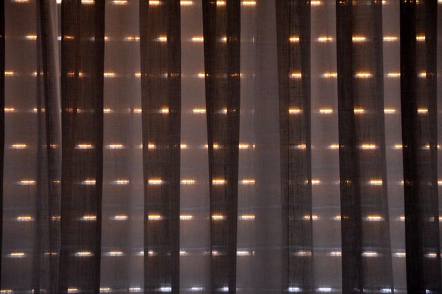 curtain and blinds in the sunset
