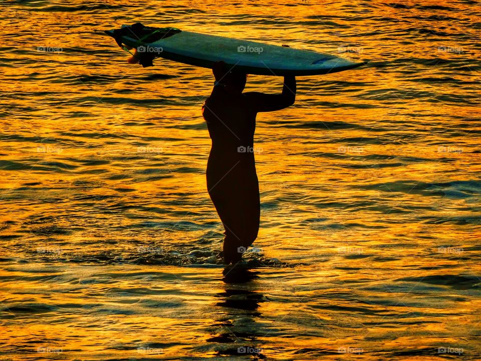 Surfer At Sunset