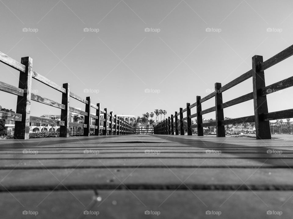Black and white view of a wooden bridge in La Paz Mexico