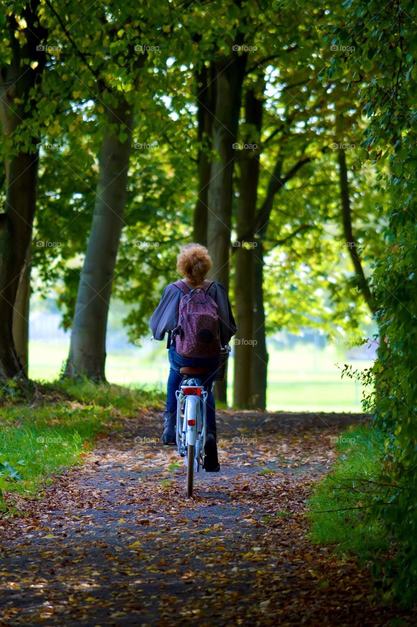 Girl riding her bike