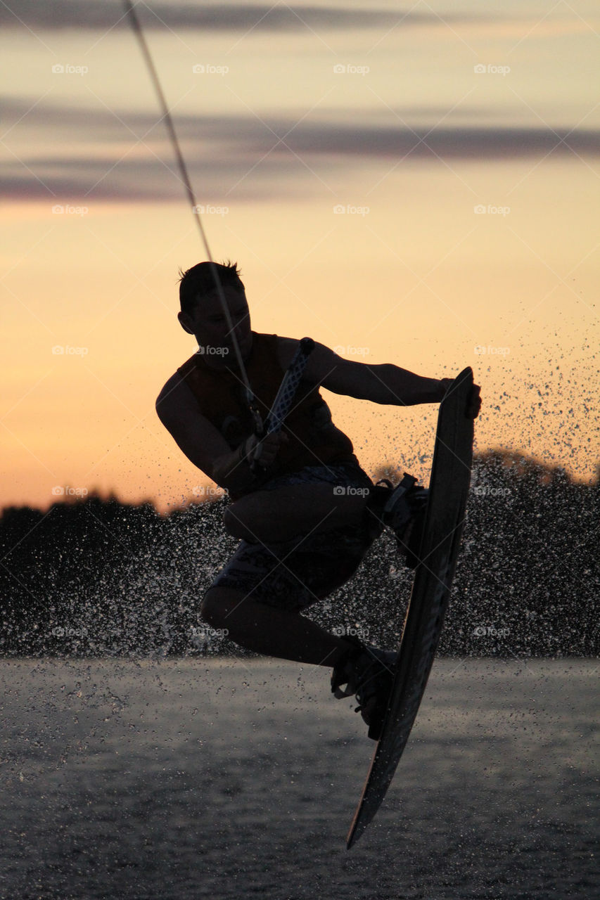 sunset lake sports boy by istvan.jakob