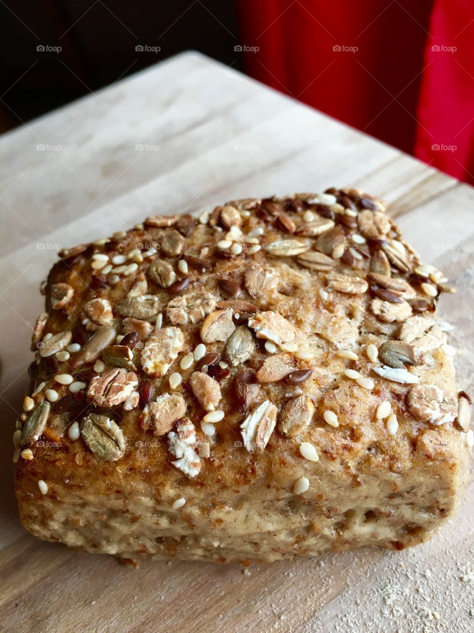 A fresh graham loaf with oatflakes and linseed.