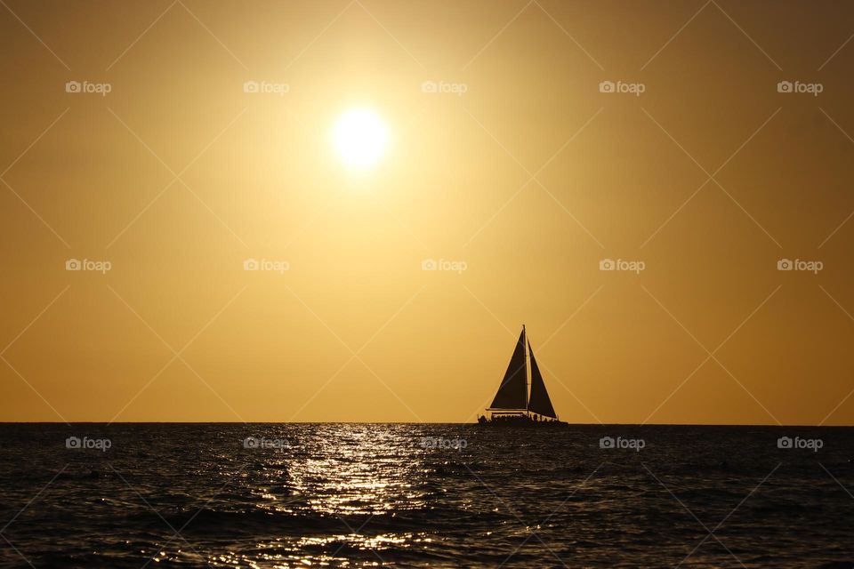 sailing boat at sunset