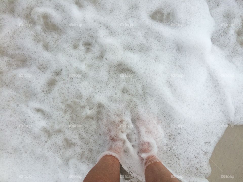 Standing in the surf on the beaches of Florida feeling the waves from Hurricane Hermine 