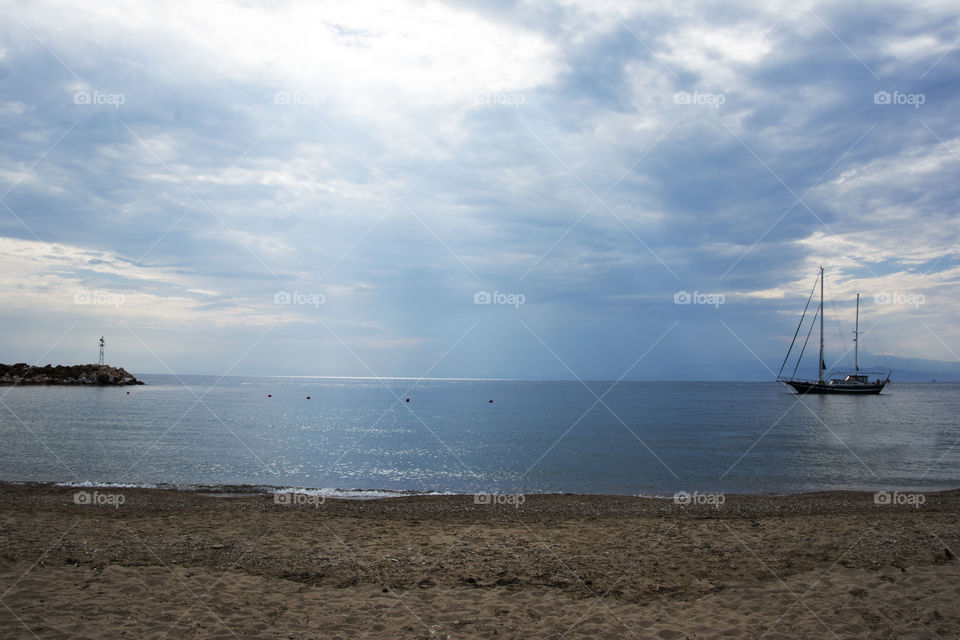 beautiful boat at sea. beautiful boat at sunset on sea horizon