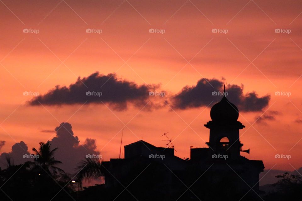 A silhouette of a mosque in the sunset, giving the soul to believe and religion