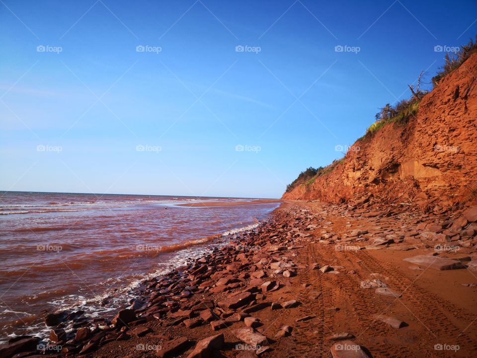 Cliff and beach of red soil. near Roseville, Prince-Edward Island, Canada