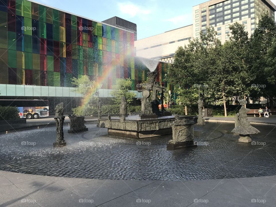 Rainbow in the “Joust” fountain by Riopelle in downtown Montréal, Canada