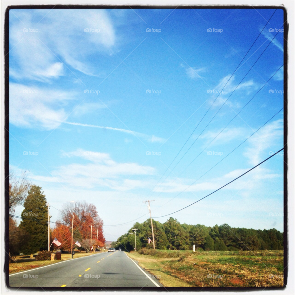 sky blue red clouds by indescribable