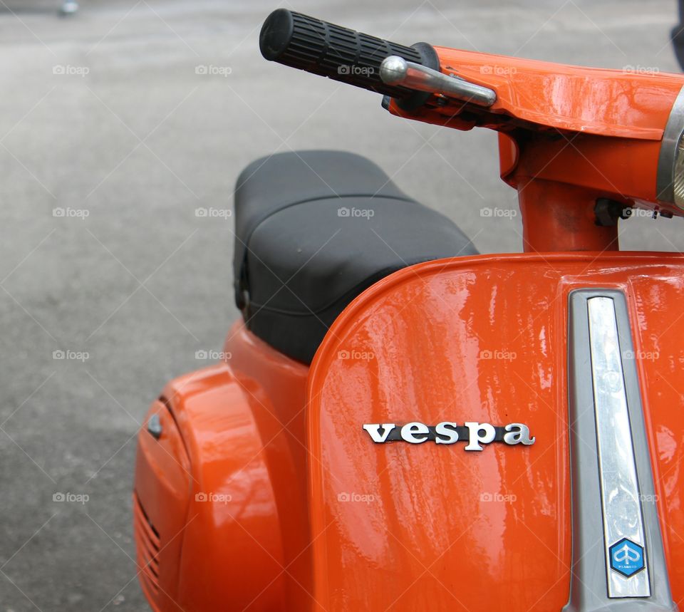 orange vespa motorbike