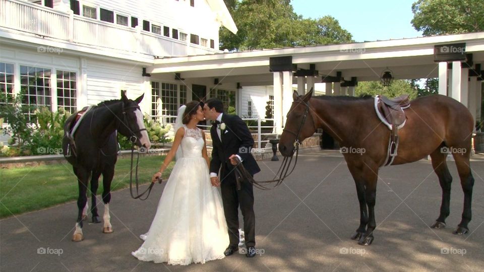 Bride and Groom with horses