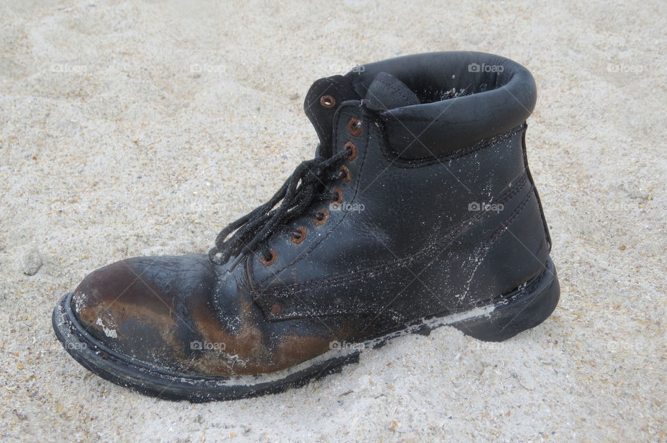 Combat boot in the sand
