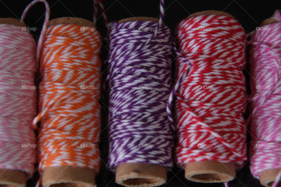 colorful twine on rolls