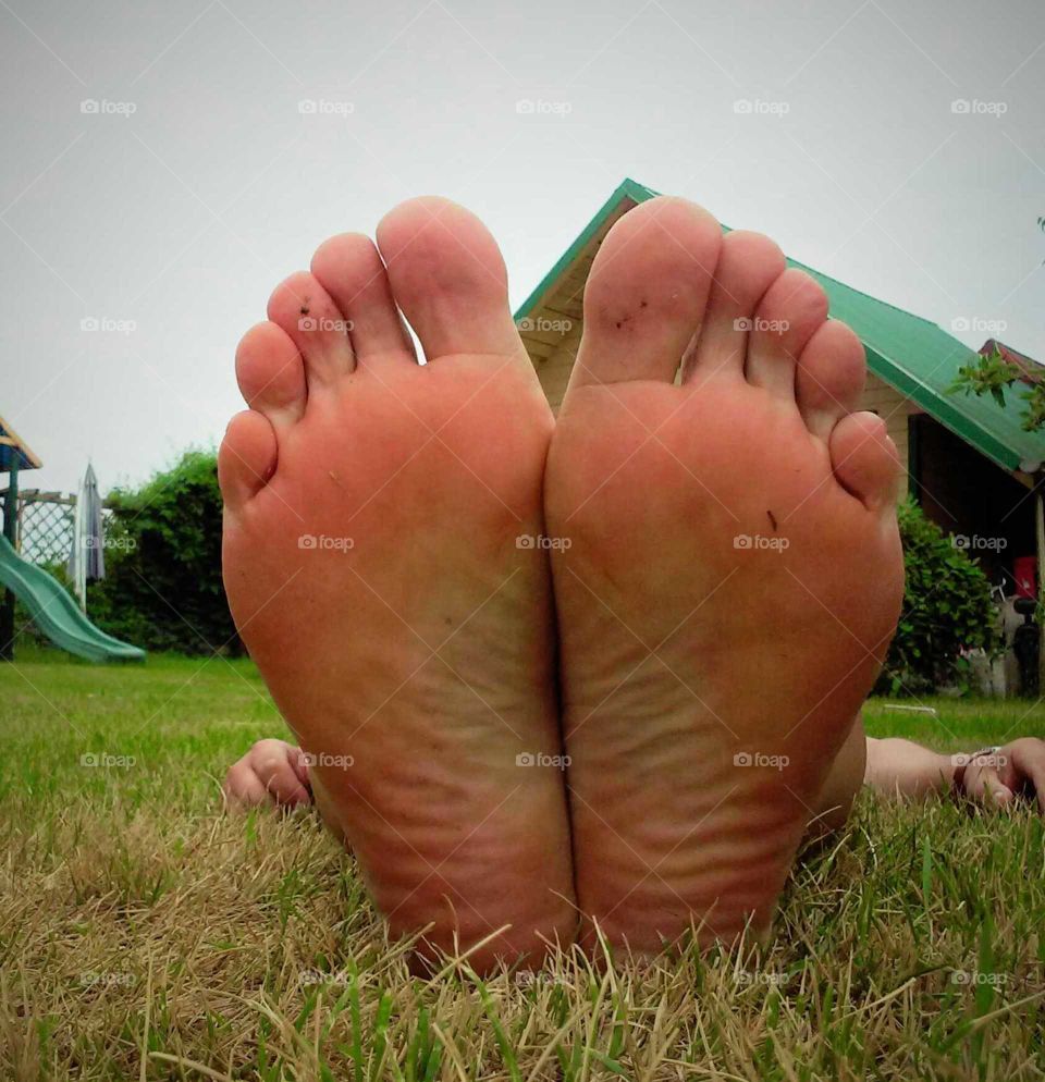 feet relaxing in the garden