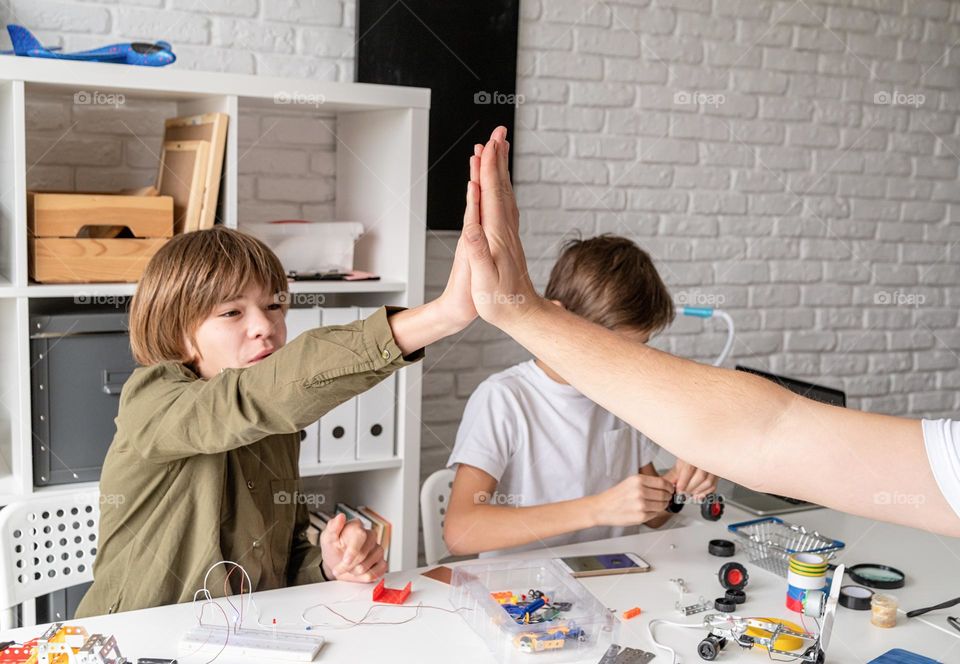 boys playing cars