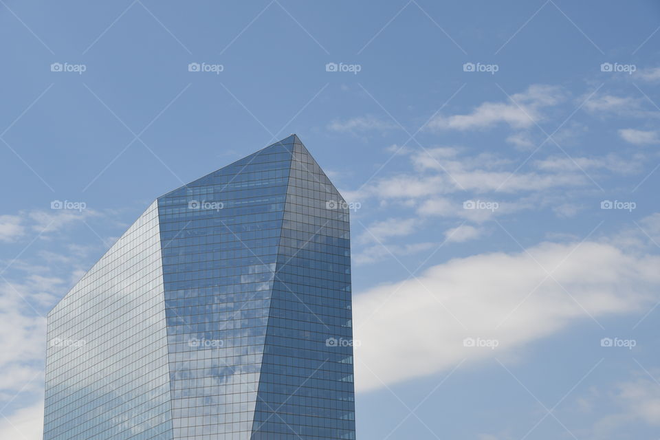 sky scraper with clouds left side