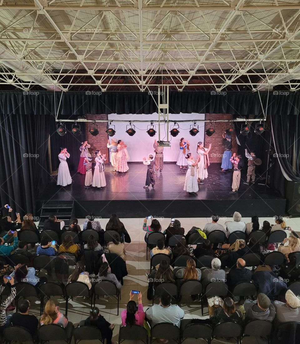 gente en el teatro